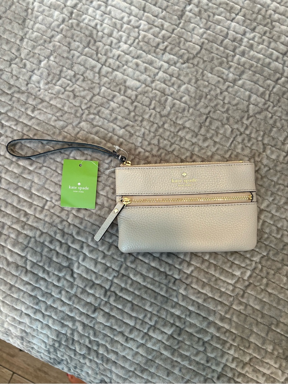 Kate Spade Pebbled Leather Wristlet in Beige